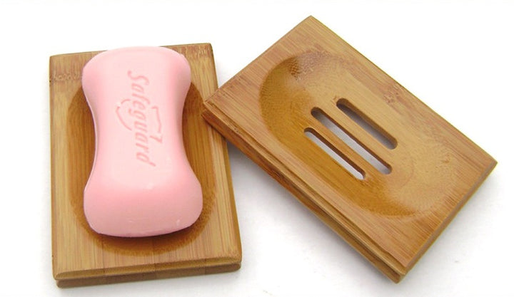 Arts And More Bamboo Wooden Soap Holder with pink Safeguard soap bar placed on top