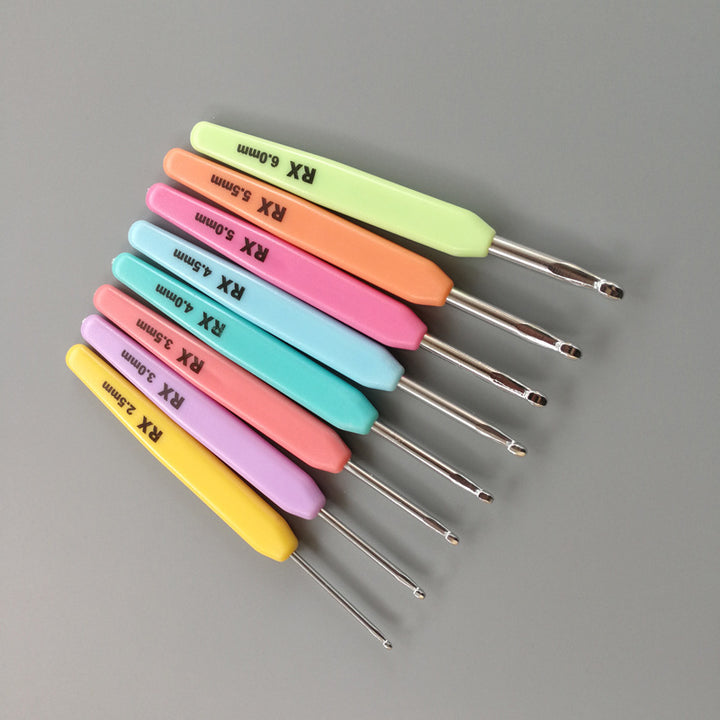 Arts And More crochet kit with colorful crochet tools in various sizes for crafting projects