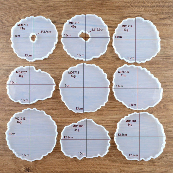 Set of crystal resin coasters in various shapes and sizes for creative craft projects