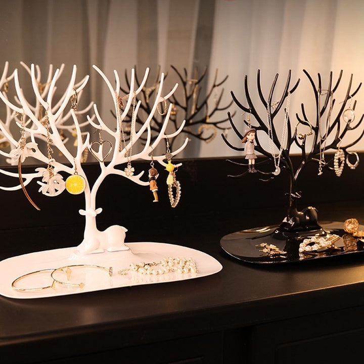 Deer Jewelry Display Stand in white and black showcasing necklaces and earrings elegantly