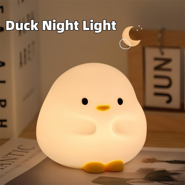 Cute Duck LED Night Lamp perfect for children's rooms, providing soft warm light for a cozy atmosphere