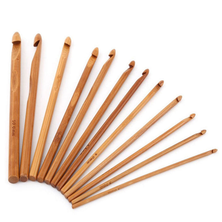 Arts And More set of wooden handmade crochet tool kit with various sizes of crochet hooks