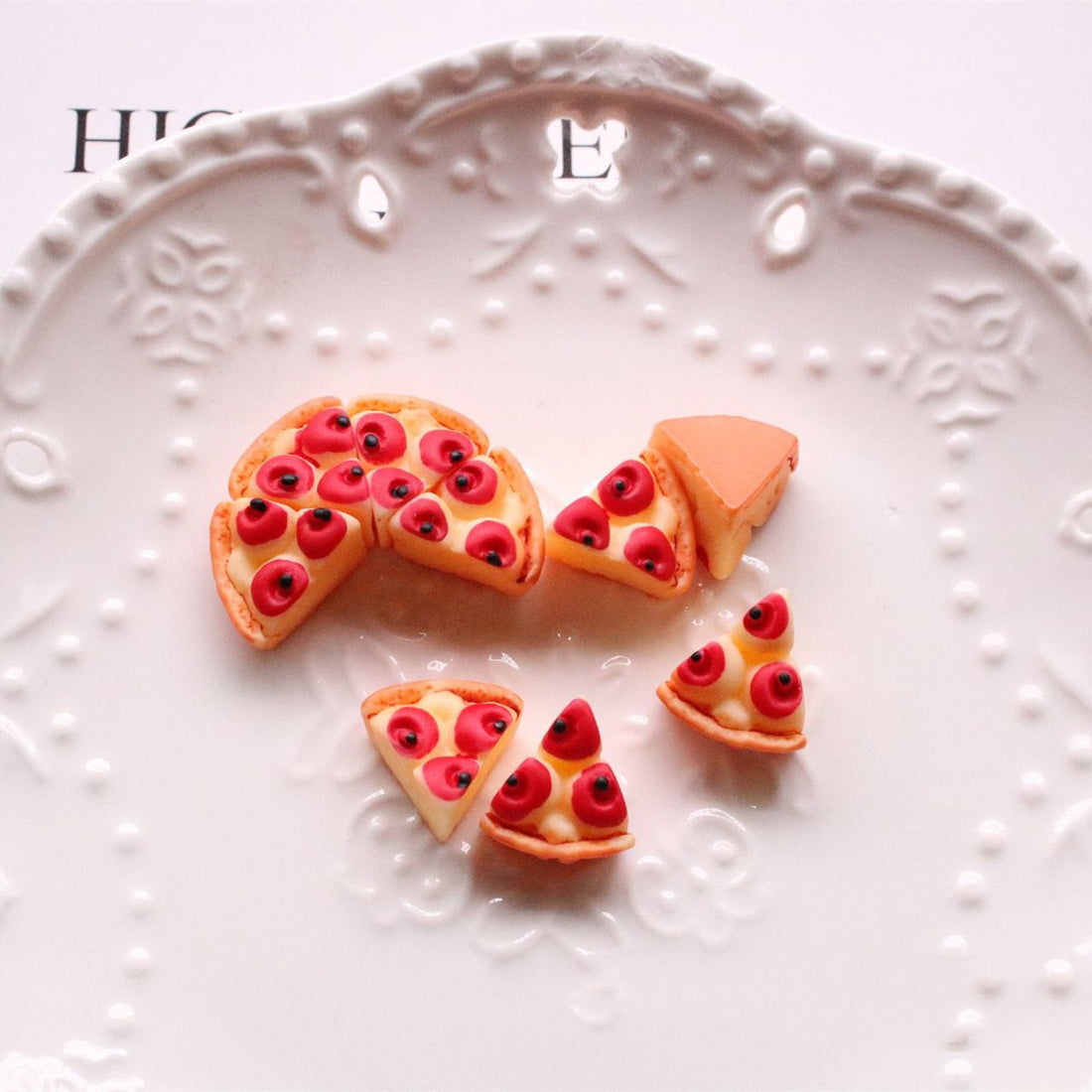Arts And More Jewelry Accessories Kit miniature pizza charms on decorative white plate
