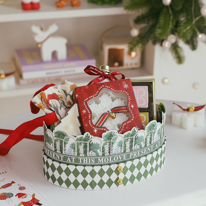 Snowflake Christmas Candle Gift Set in a Decorative Basket with Festive Items and Ribbon