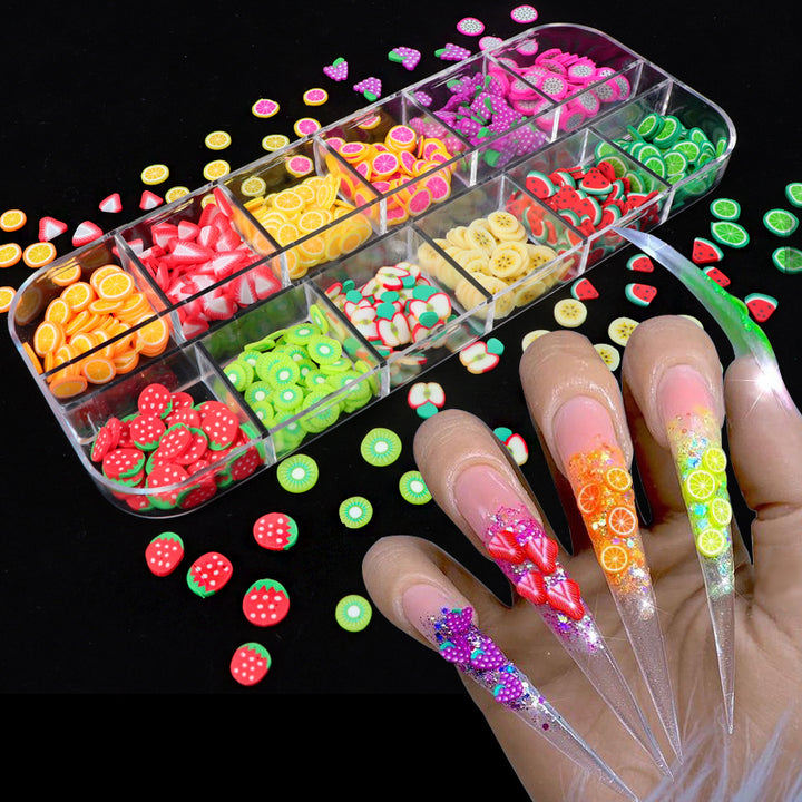 Colorful Nail Jewelry in a Clear Organizer with Various Fruit Designs for Creative Nail Art