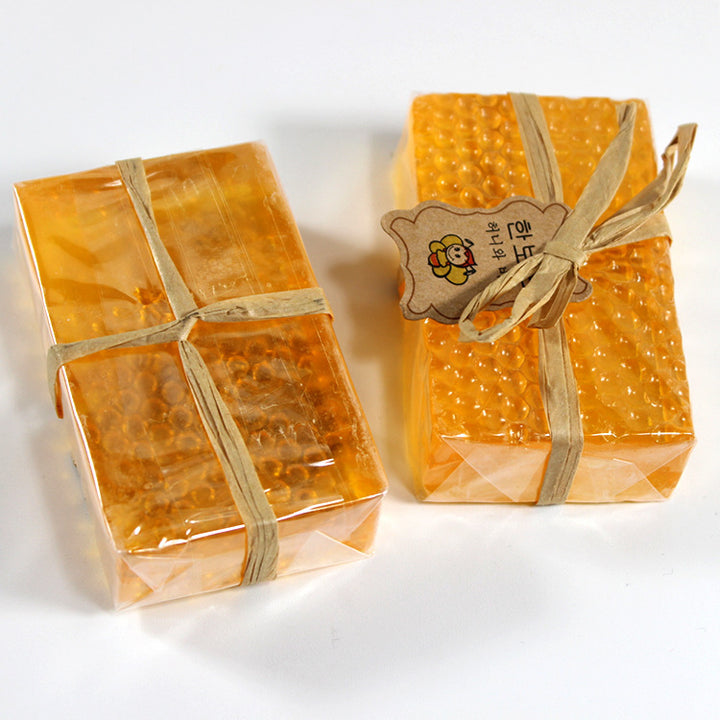 Arts And More Propolis Honey Soap bars wrapped with natural twine and honeycomb texture