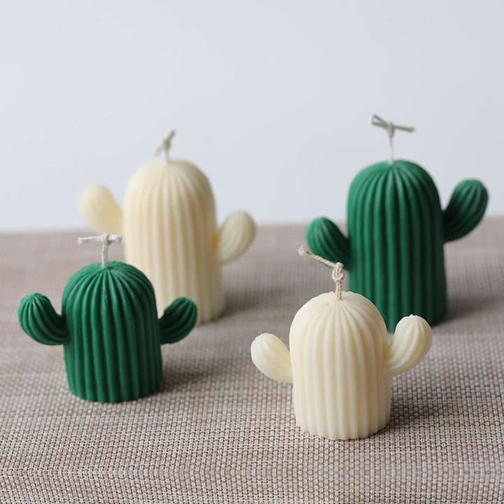 Silicone Candle Mold featuring cute cactus-shaped candles in green and white colors for decorative use