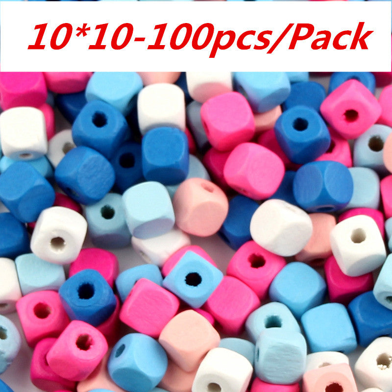 Colorful cube-shaped beaded materials in pink, blue, white, and peach for crafting projects