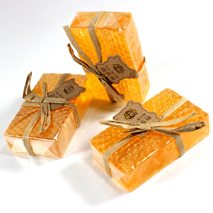 Arts And More Propolis Honey Soap bars wrapped with rustic brown string and honeycomb texture