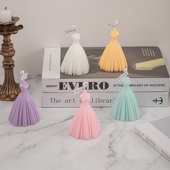 Five colorful wedding candles shaped like elegant dresses for bridal decorations and events