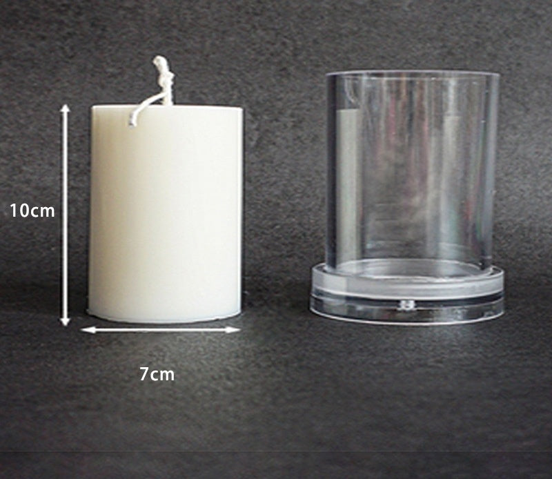 Clear Acrylic Candle Mold next to a white candle showing 10cm height and 7cm diameter by Arts And More