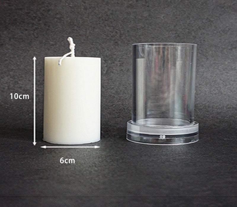 Clear Acrylic Candle Mold next to white candle showing 6cm diameter and 10cm height by Arts And More