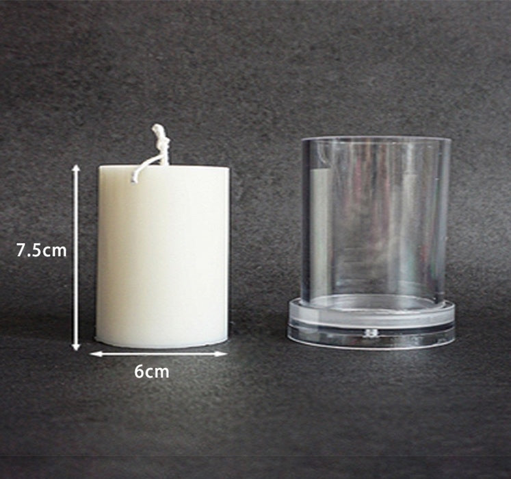 Clear Arts And More Acrylic Candle Mold next to a white candle measuring 7.5 cm tall and 6 cm wide