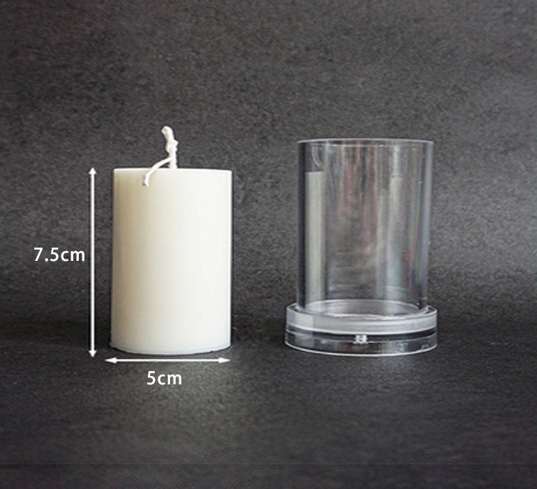 Clear Acrylic Candle Mold next to a white candle measuring 7.5 cm by 5 cm for candle making