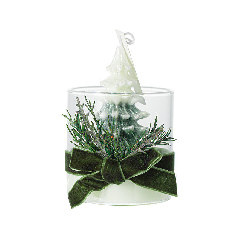 Candle Gift Box featuring a green tree-shaped candle and decorative greenery with a ribbon
