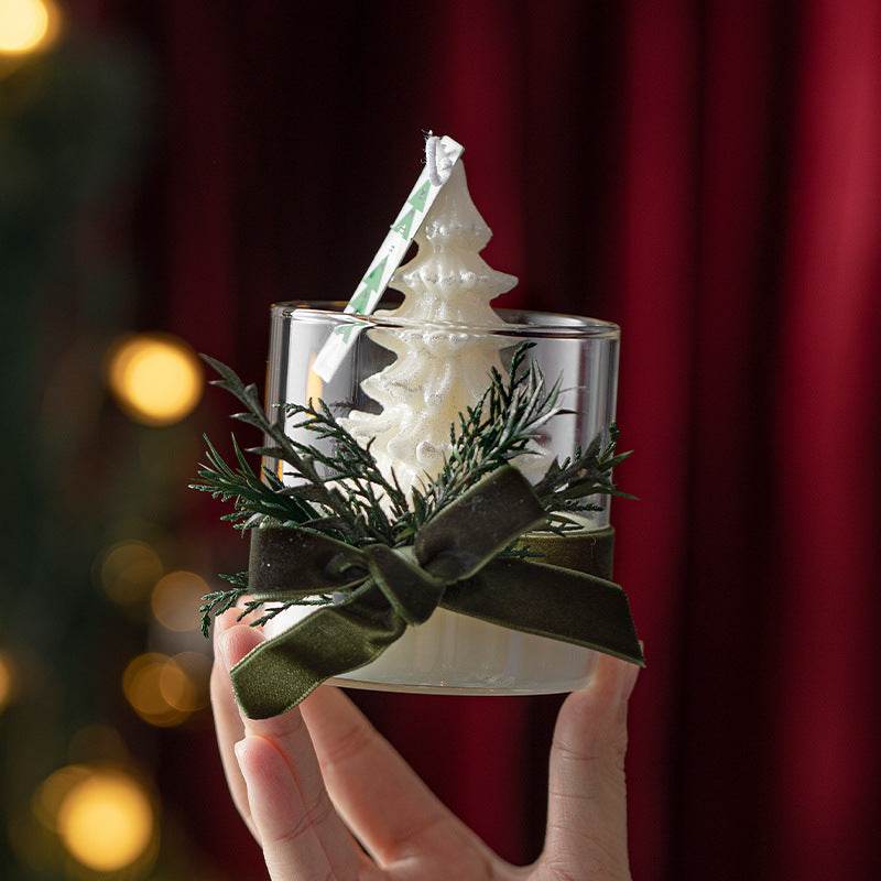 Elegant Candle Gift Box featuring a white candle shaped like a tree, adorned with greenery