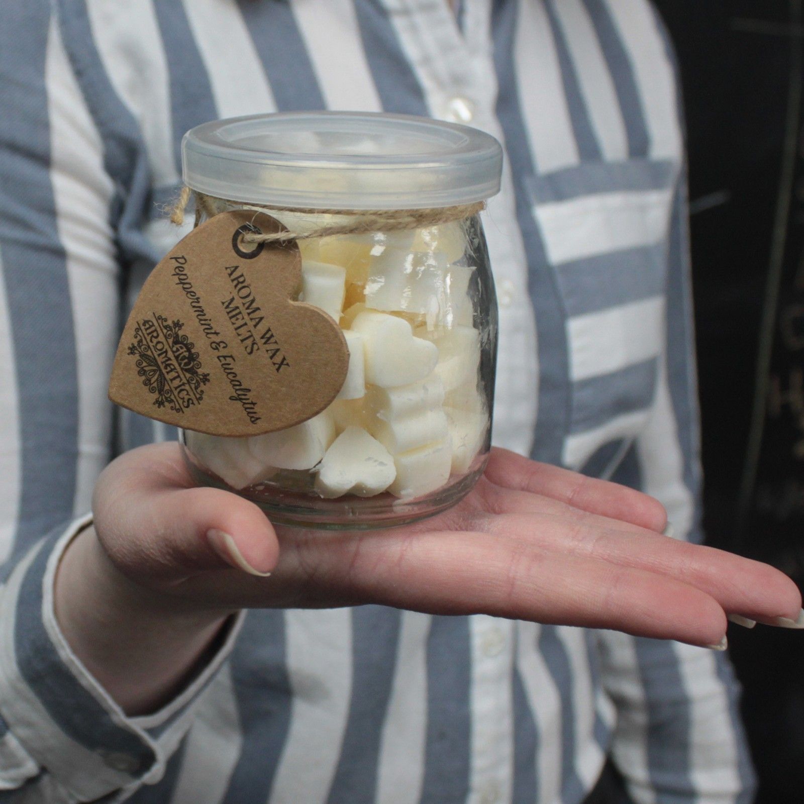 Glass jar of Rosemary Soy Wax Melts for relaxing home fragrance