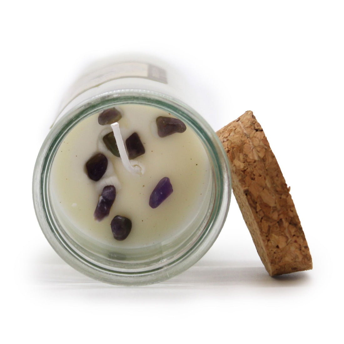 Success magic spell candle with amethyst crystals