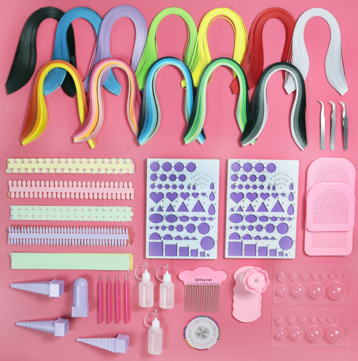 Beginner Paper Craft Kit by Arts And More with colorful quilling strips and crafting tools on pink background