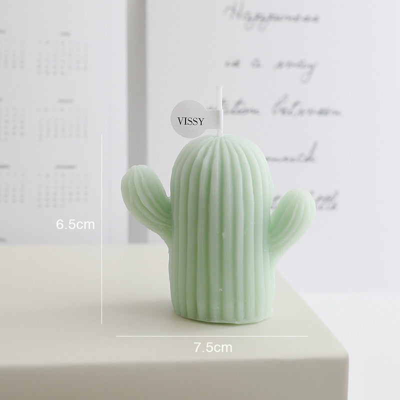 Cactus Candle Gift Box featuring a green cactus-shaped candle with ribbed texture for home decor