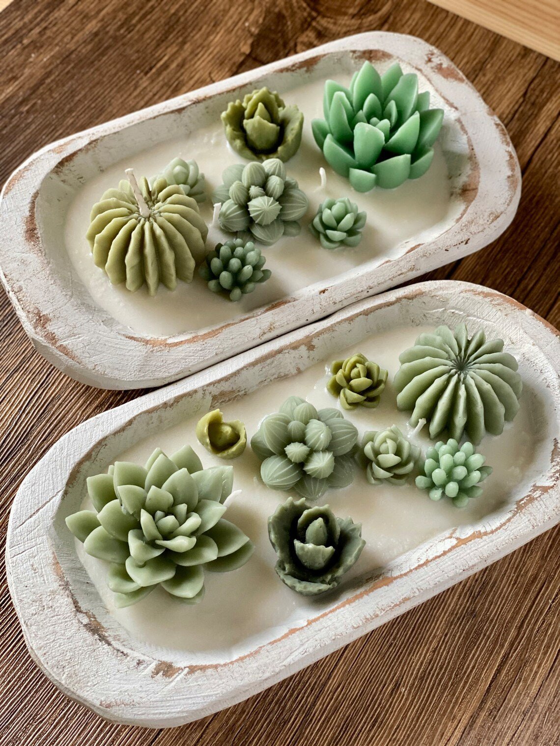 Cactus Garden Candle featuring an assortment of succulent shapes in green and cream hues