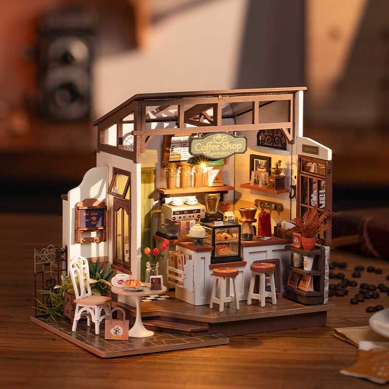Cafe Miniature House Kit by Robotime Rolife with intricate interior details and cozy coffee shop atmosphere