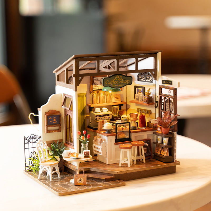 Robotime Rolife Cafe Miniature House Kit featuring detailed coffee shop decor and furnishings