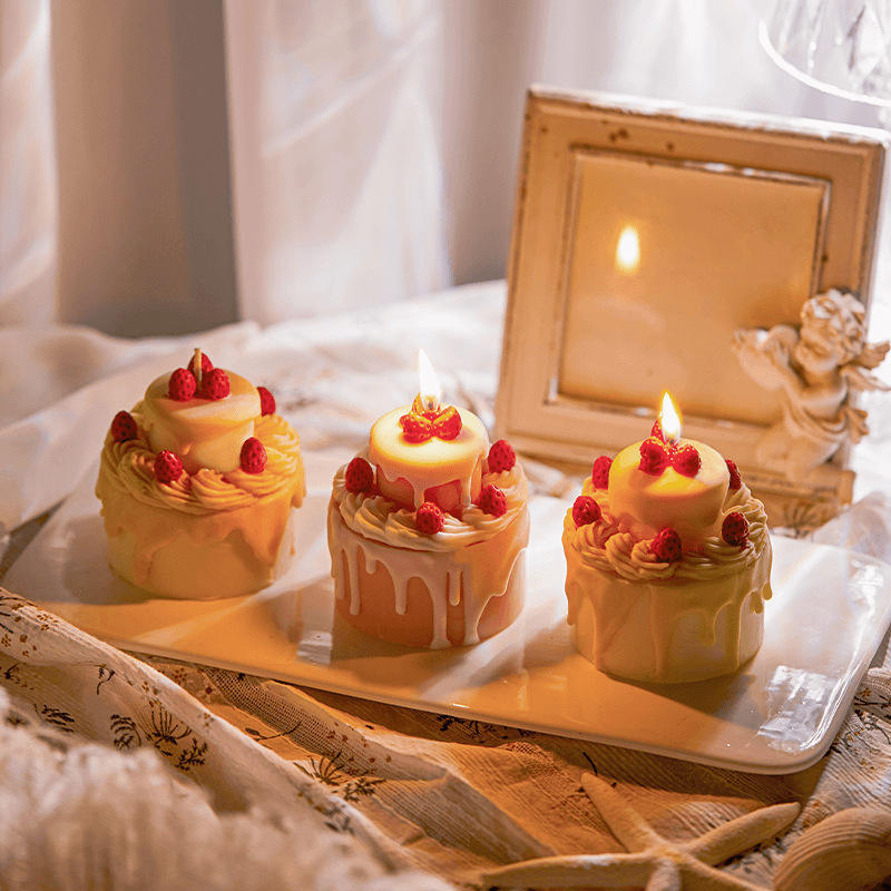 Elegant cake birthday candle set with creamy frosting and raspberry accents, perfect for celebrations