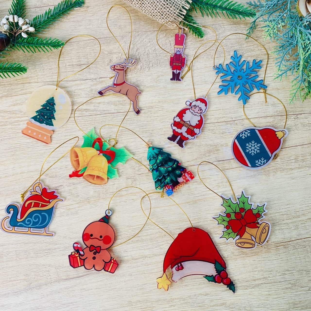 Colorful Christmas Decor Pendants featuring Santa, reindeer, Christmas trees, and more festive designs