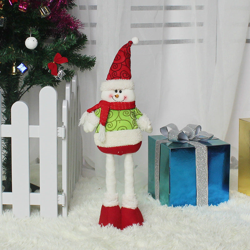 Colorful festive Christmas decorations featuring a playful snowman with a striped hat and happy expression
