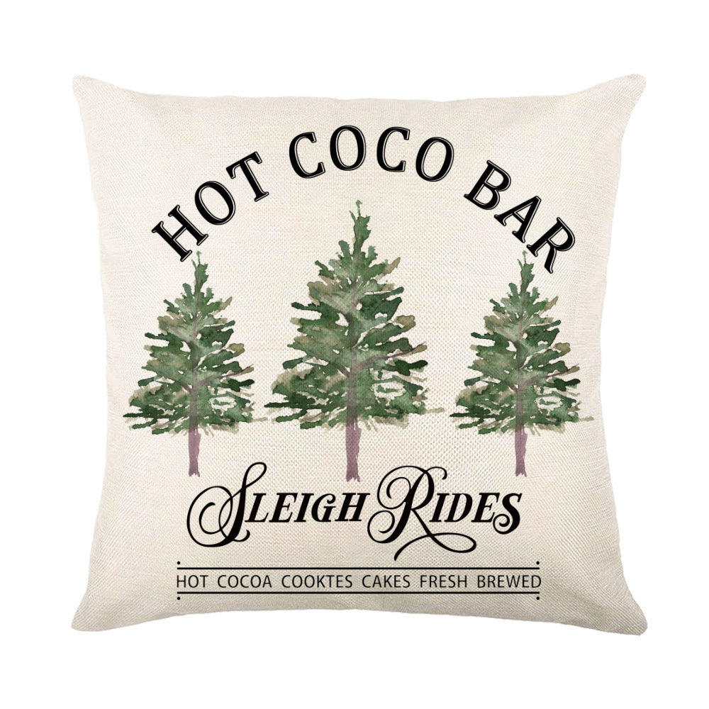 Christmas Pillow Covers featuring a cozy Hot Cocoa Bar design with pine trees and festive typography