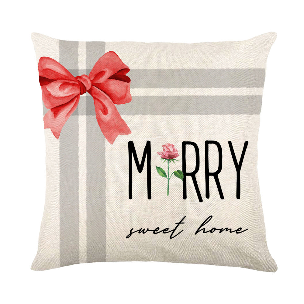 Christmas Pillow Covers featuring a festive design with a bow and floral accents for holiday decor
