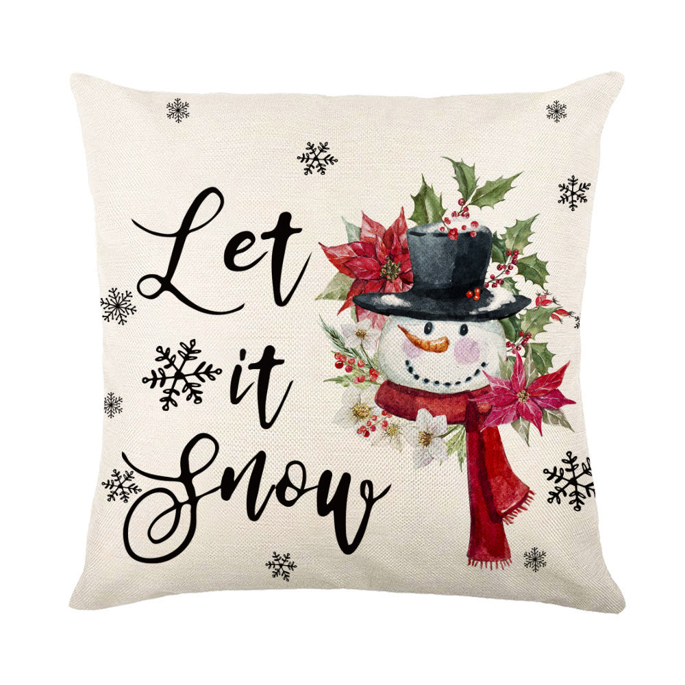 Christmas Pillow Covers featuring a snowman with the phrase Let it Snow and festive decorations