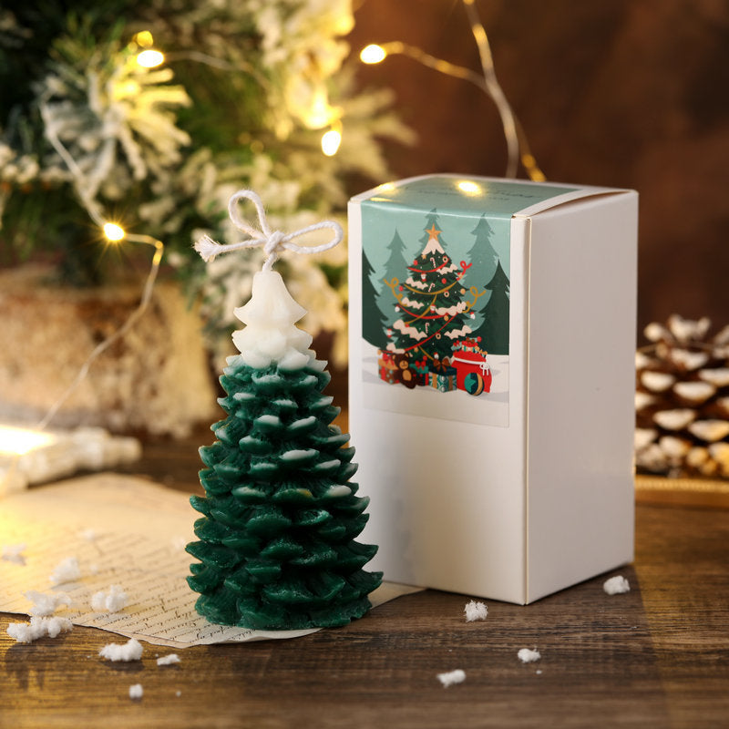 Christmas Soy Wax Aromatherapy Candle shaped like a pine tree in green with a decorative box