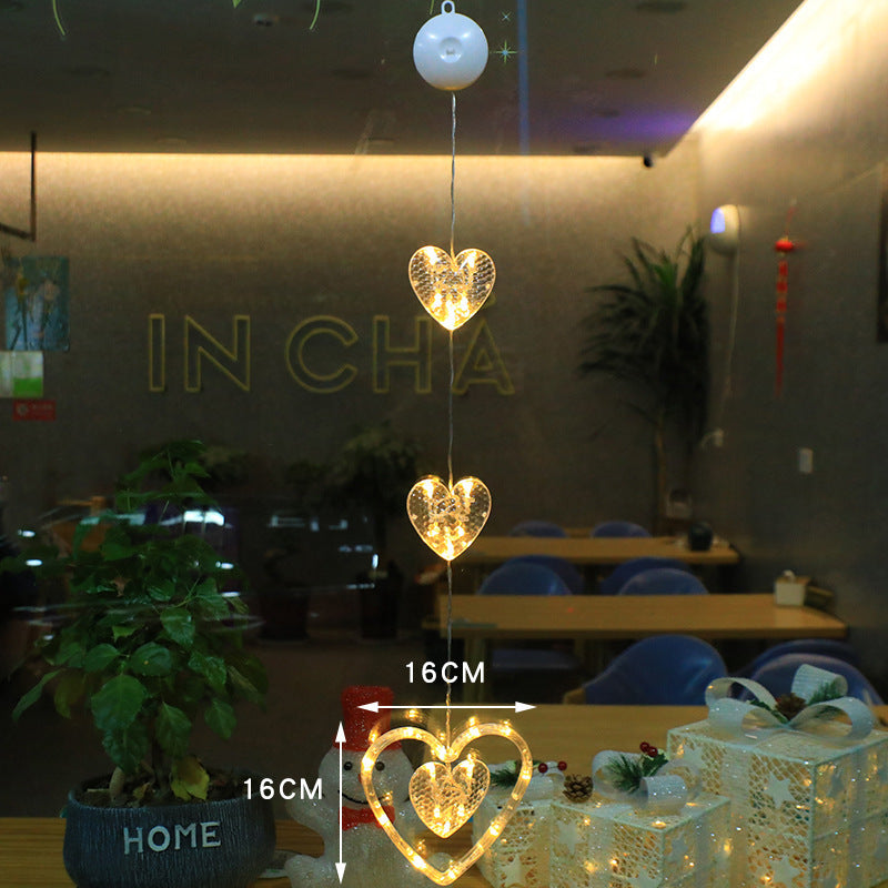 Christmas Star Hanging Lamp adorned with heart-shaped lights for festive home decoration