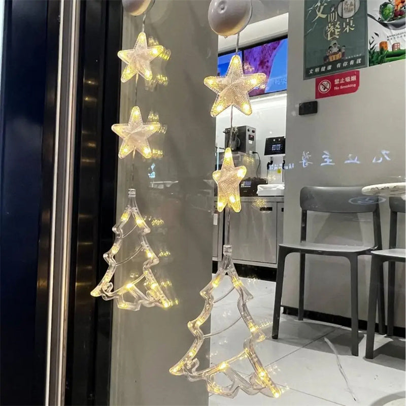 Christmas Star Hanging Lamp with illuminated stars and tree shapes for festive decor