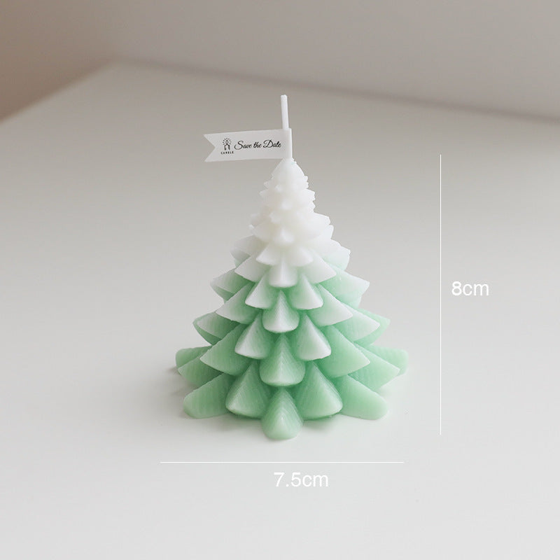 Christmas Tree Scented Candle in green and white, ideal for festive decor and adding holiday fragrance