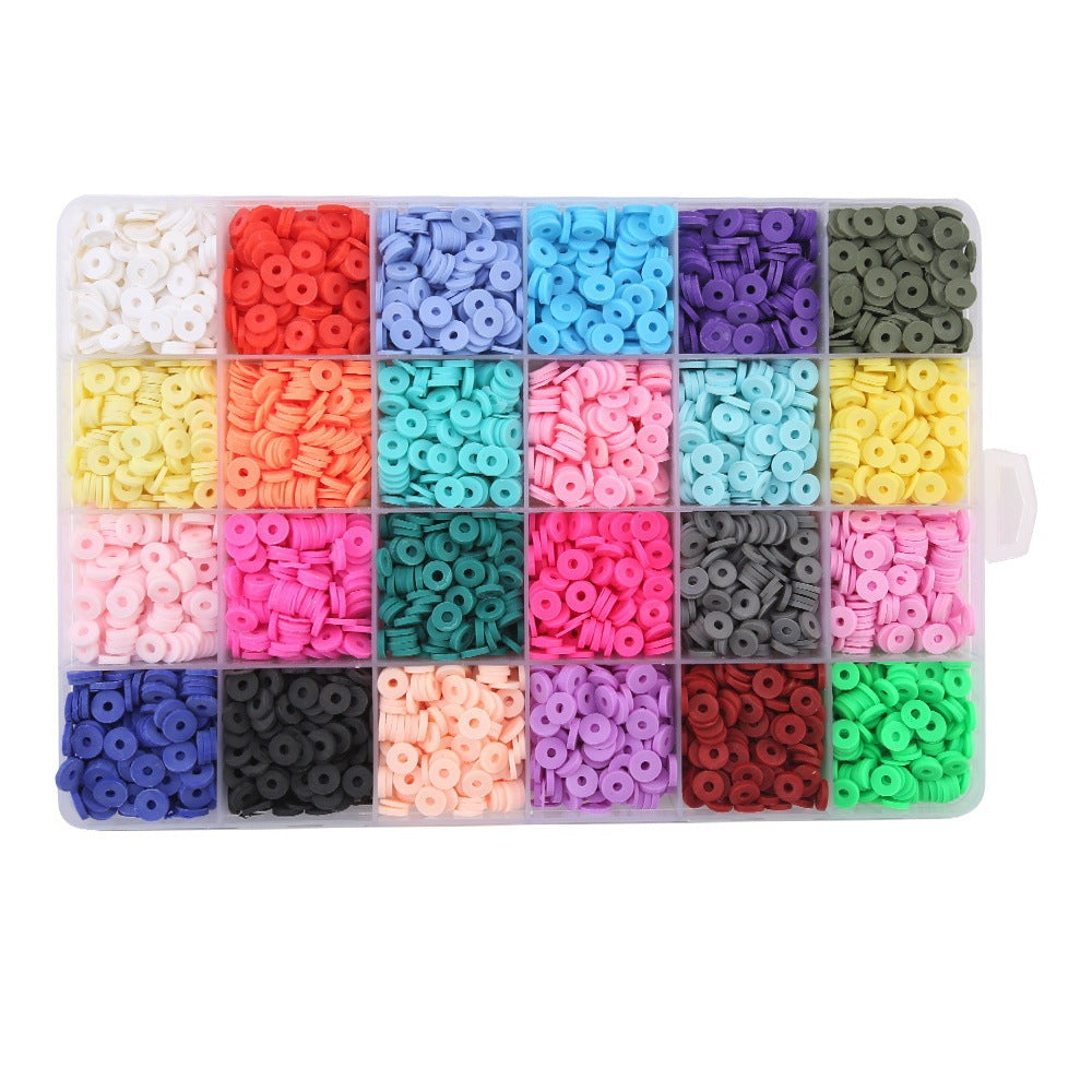 Arts And More colorful clay beads organized in a plastic storage box for craft projects