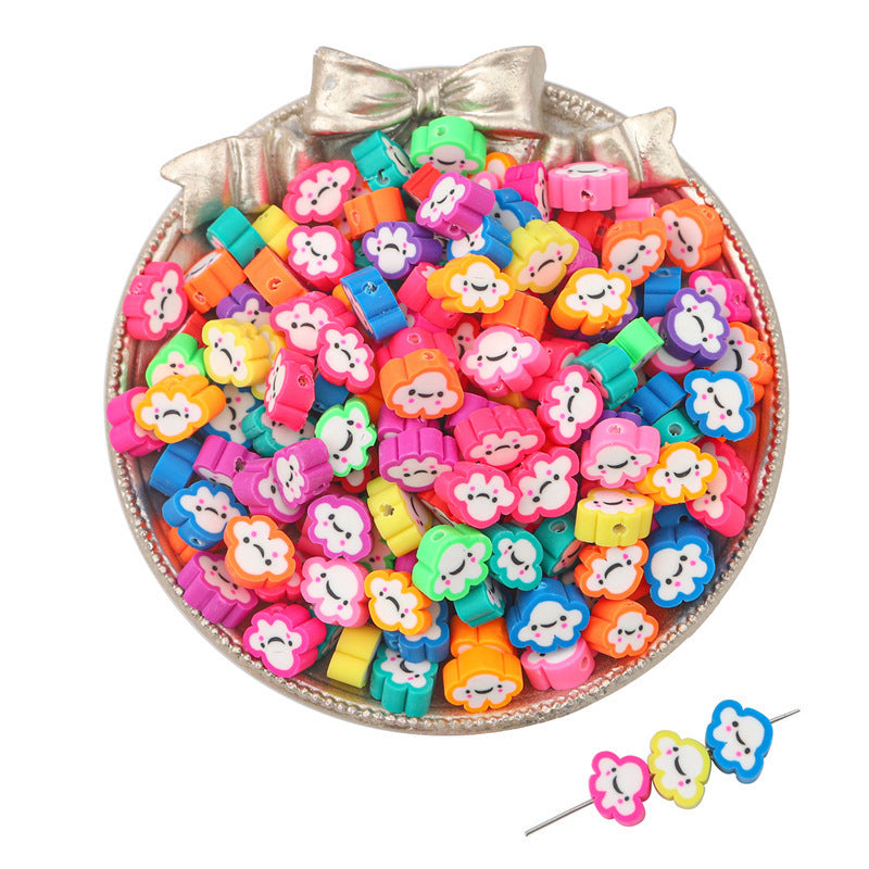 Colorful Arts And More clay beads shaped like smiling flowers in a silver bowl for craft projects