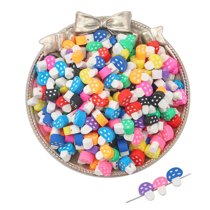 Colorful mushroom shaped clay beads for crafting displayed on a decorative silver tray by Arts And More