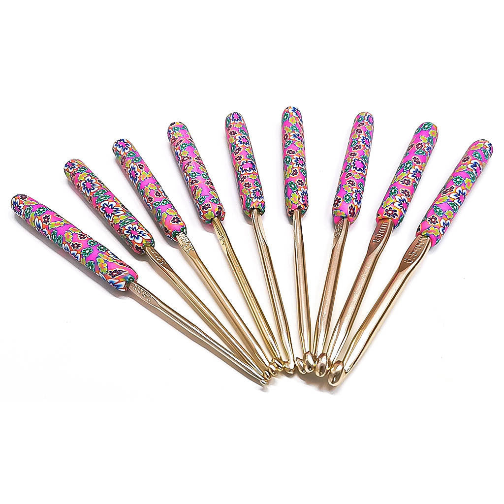 Arts And More Crochet Set with colorful floral handles and assorted hook sizes for detailed stitching