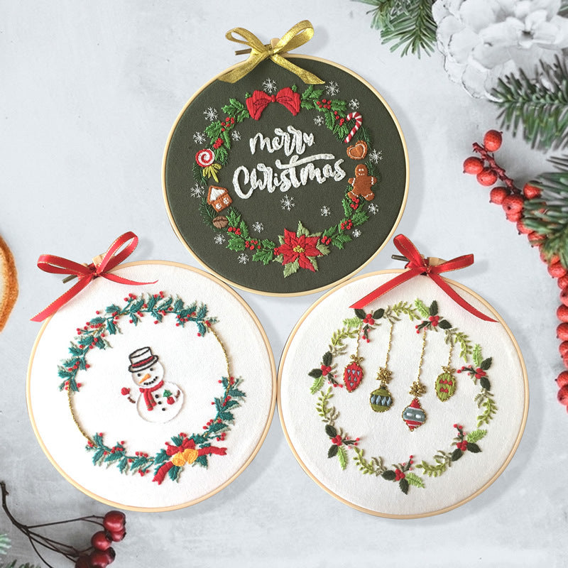 Festive Cross Stitch Kit featuring Christmas designs like snowman and ornaments for seasonal decor
