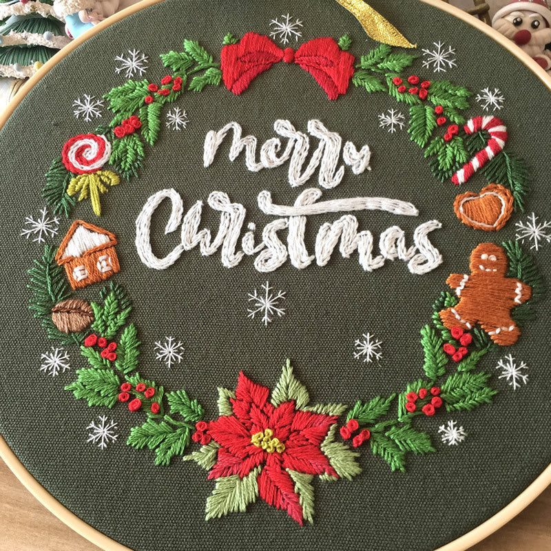 Festive Cross Stitch Kit featuring a Christmas wreath with 'Merry Christmas' in colorful embroidery