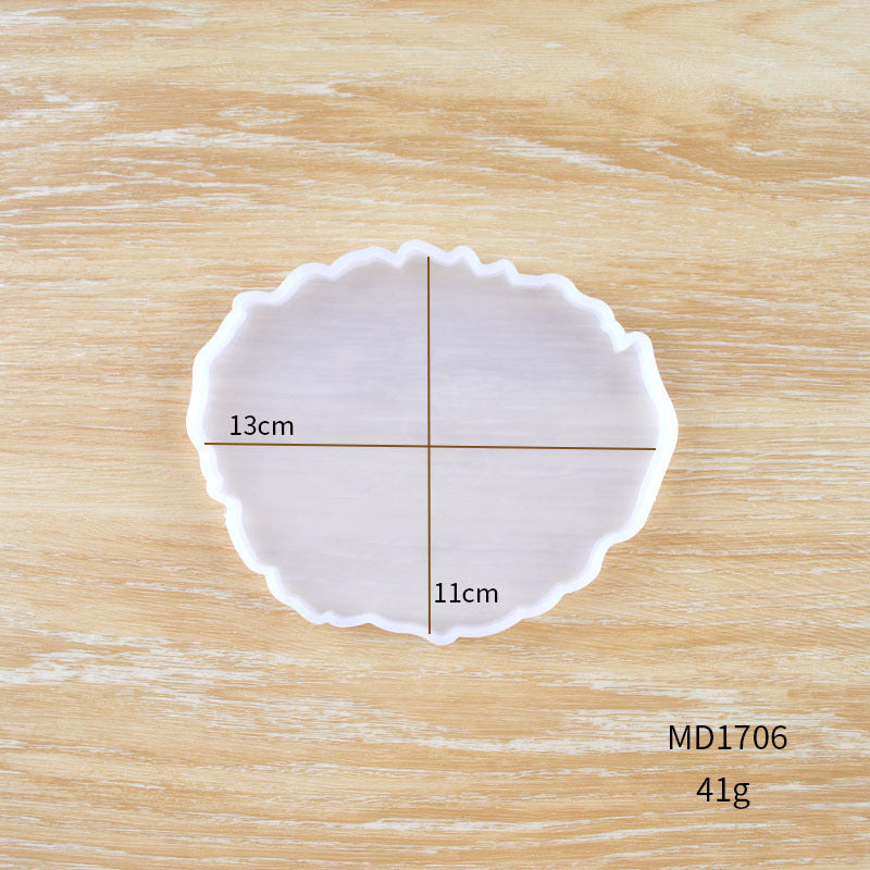Clear silicone mold for making a crystal resin coaster in wavy shape, 13cm by 11cm