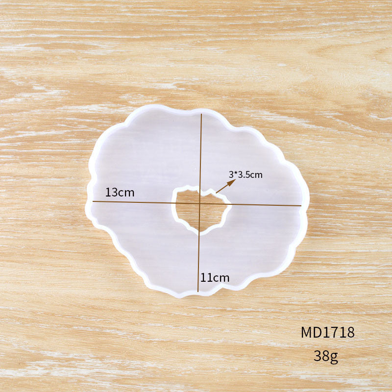 Silicone mold for making a crystal resin coaster in a flower shape, measuring 13x11cm