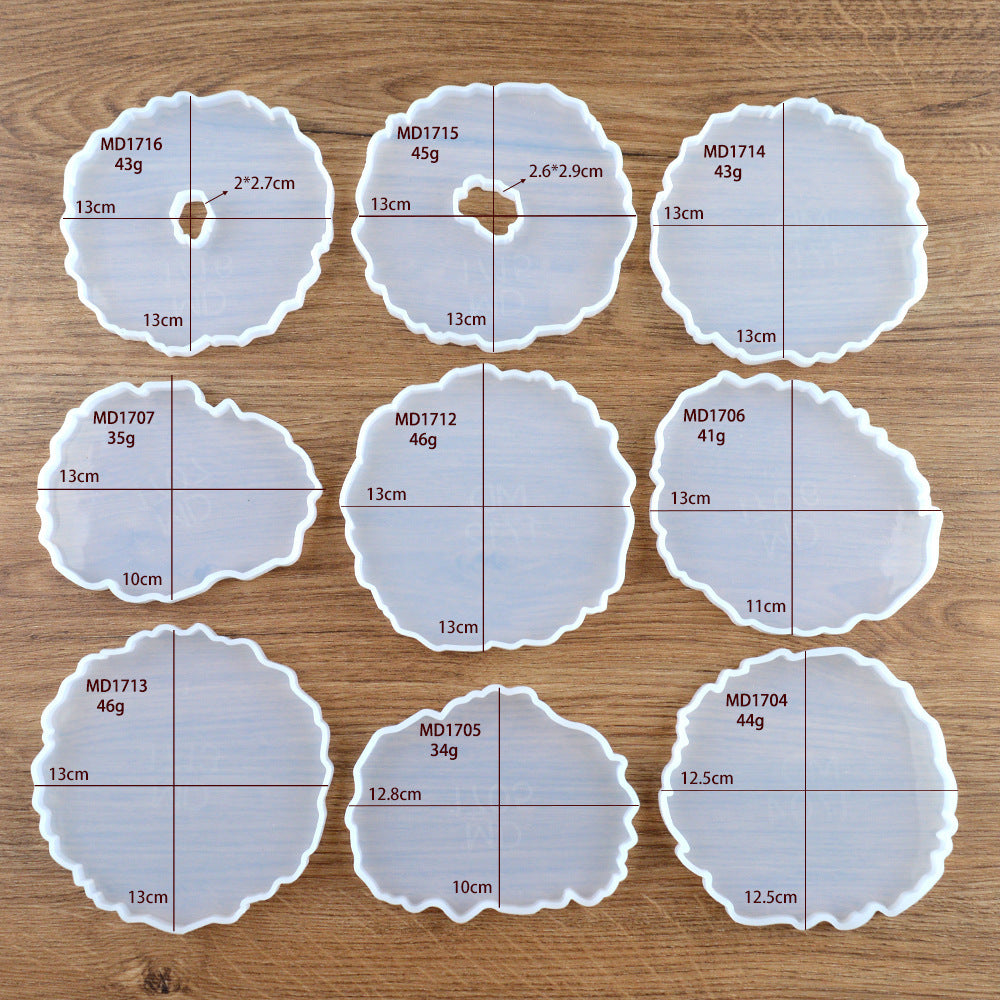 Set of crystal resin coasters in various shapes and sizes for creative craft projects
