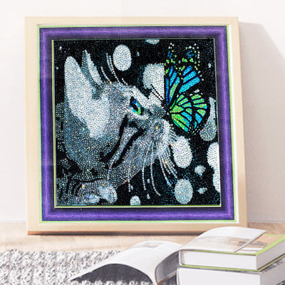 Diamond Painting Kit featuring a cat and butterfly design in a framed artwork for creativity enthusiasts