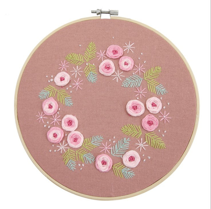 DIY Embroidery Practice Kits featuring a floral wreath design with pink flowers and green leaves