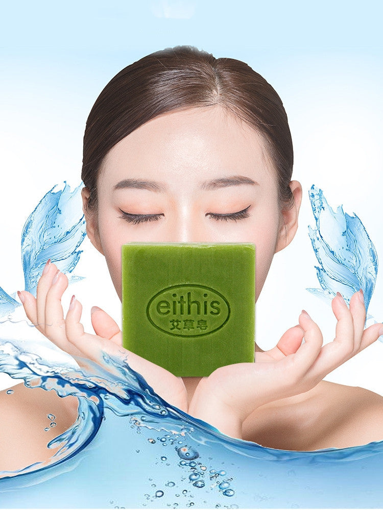 Arts And More green Bath Soap held by woman with closed eyes and water splash background