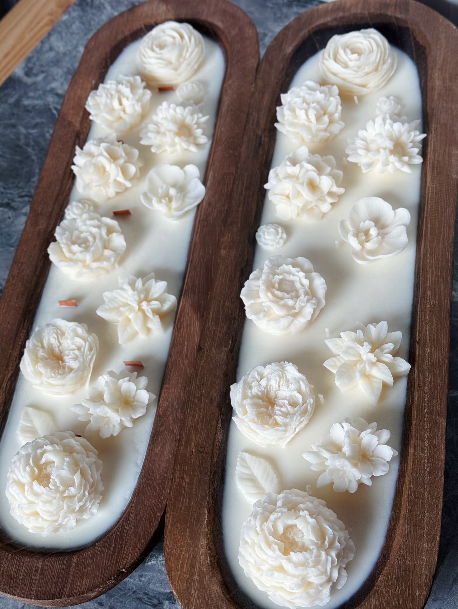 Garden Dough Bowl Candle in a rustic wooden holder featuring intricate floral designs for home decor